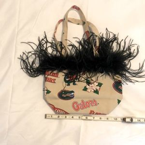 Florida Gator purse with black feather trim